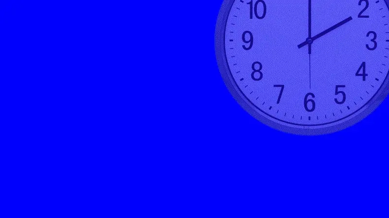 Part of a wall clock on a bright blue background