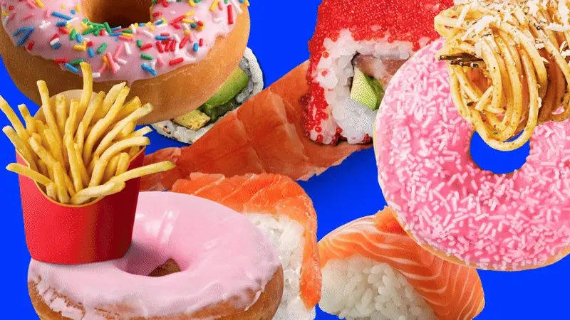 Colourful collage of donuts, sushi and French fries on a blue background