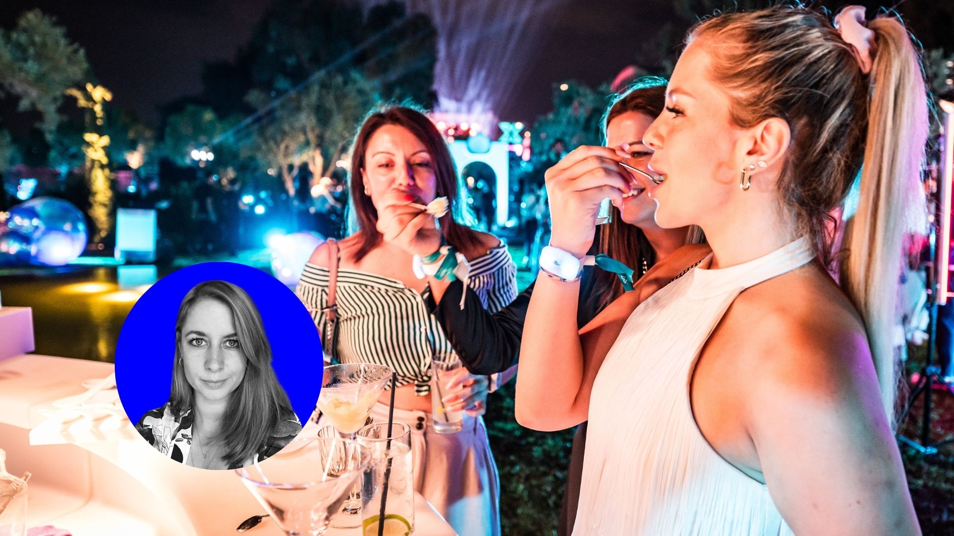 A lively outdoor event scene with women enjoying food and drinks under colorful lighting. A blue circular inset shows a black-and-white portrait of a woman. Battle Royal Studios