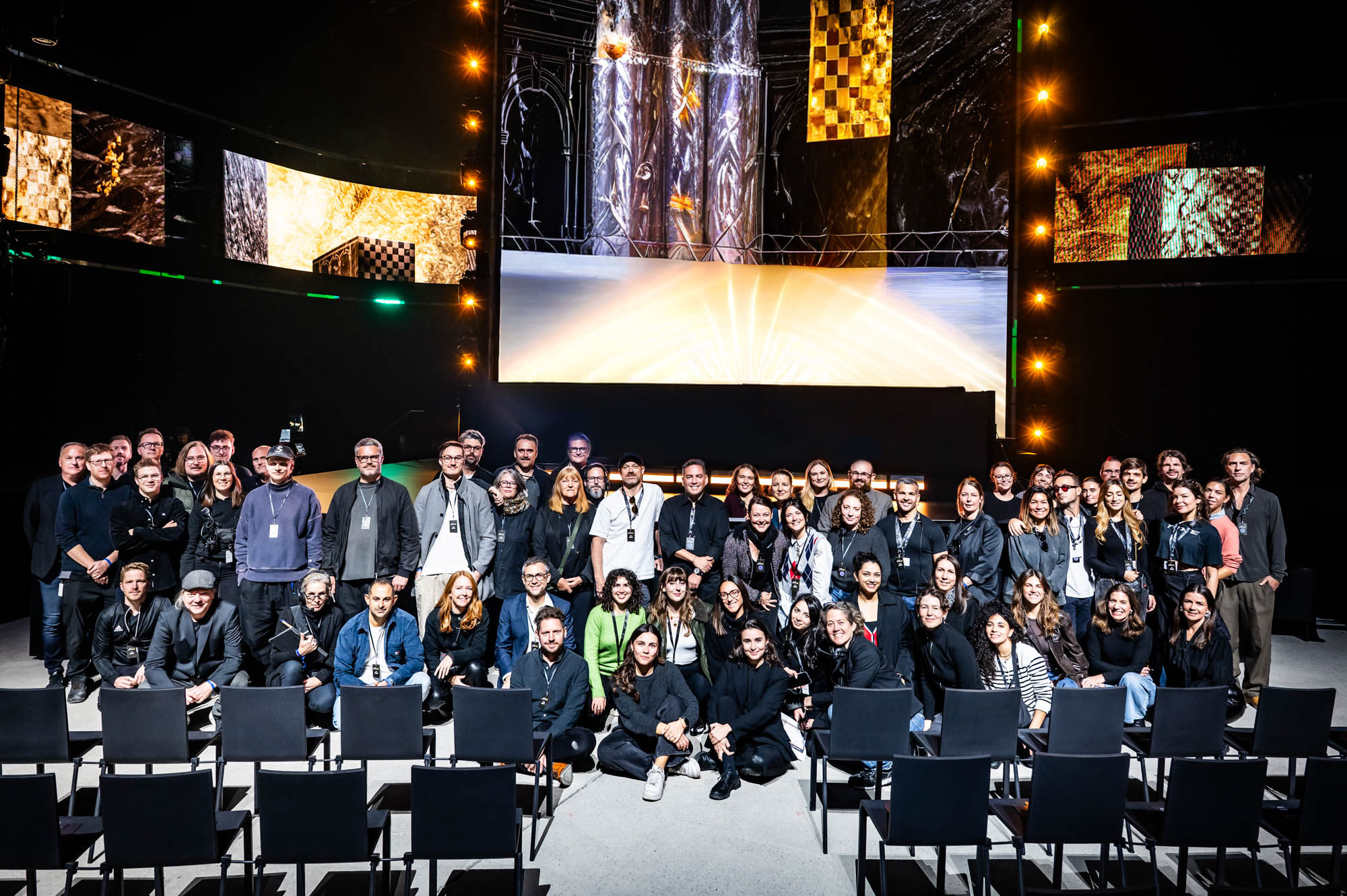 Battle Royal Studios crew and partners in a group photo on the event floor.